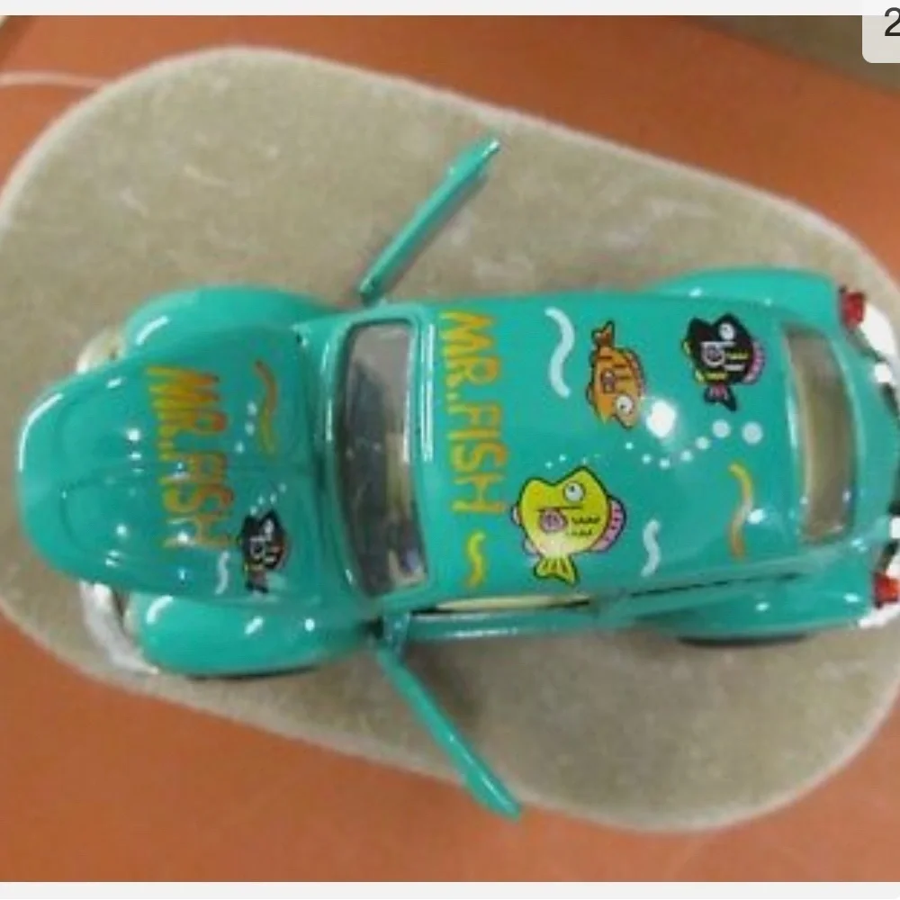 DIECAST VW BEETLE TOY CAR GREEN MR FISH LOGOS SS4701